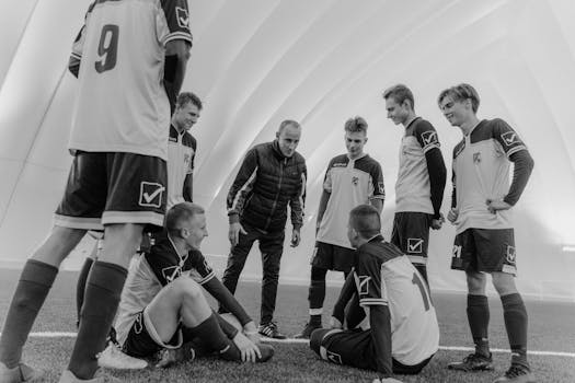 coach giving feedback to players