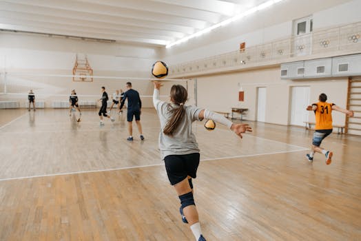 lacrosse players engaged in a physical play